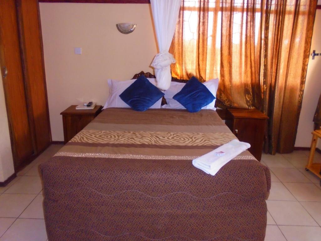 White Rose Lodge Livingstone Pokoj fotografie