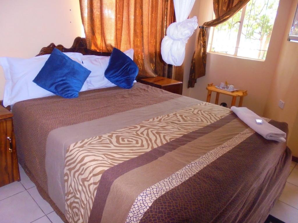 White Rose Lodge Livingstone Pokoj fotografie